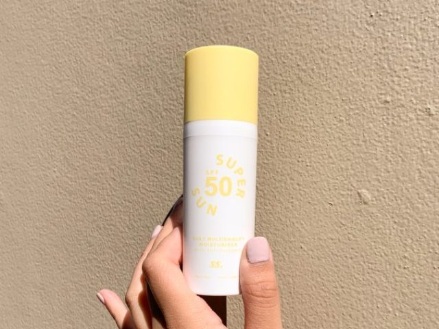 White and yellow plastic tube bottle